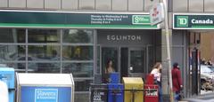 Northeast entrance of Toronto Transit Commission's Eglinton Station with TD Canada Trust bank exterior in Toronto