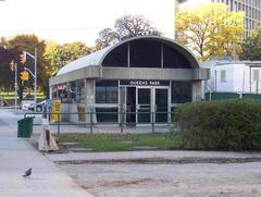Queens Park TTC subway station interior in Toronto with yellow and purple color scheme