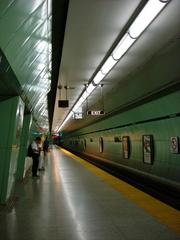 St Patrick's Platform train station with tracks and platform under cloudy sky