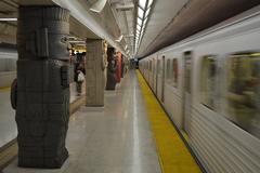 Museum TTC Subway Station with colorful mural and platform