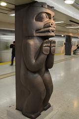Interior of Museum TTC Subway Station with arched platforms and subway trains