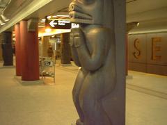 Sculpture-covered pillar at Museum Station, TTC, Toronto