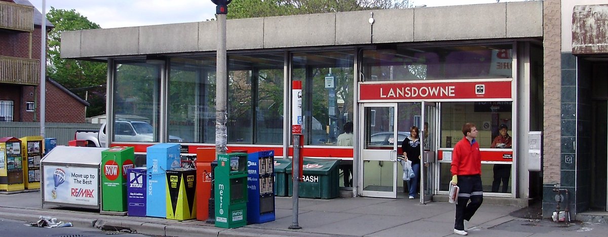 Exterior view of Toronto Transit Commission's Lansdowne station with a streetcar in front
