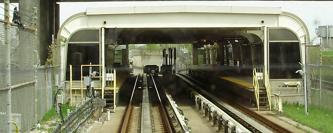 Toronto Transit Commission Ellesmere station in Scarborough seen from rear car of southbound RT train