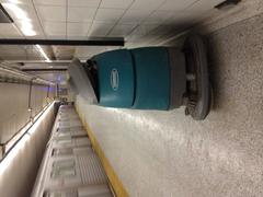Tennant Walk Behind floor scrubber at Sherbourne Subway station platform