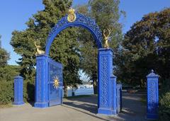 Blue Gate entrance in Stockholm, Sweden with decorative lanterns and greenery