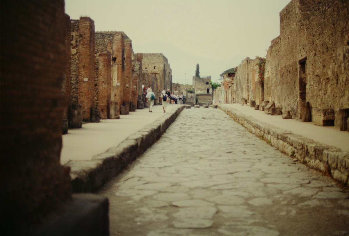 Street view of Via di Mercurio in ancient Pompeii looking north