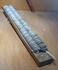Money counter exhibit at Vietnam Museum of Ethnology in Hanoi