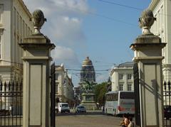 Brussels Park in summer with Royal Square, Godefroid de Bouillon statue, and Brussels Palace of Justice in view