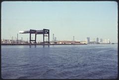 Castle Island with Fishing Pier seen from the water on a clear day