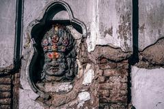 Ancient Bhairav stone carving in Kathmandu, Nepal
