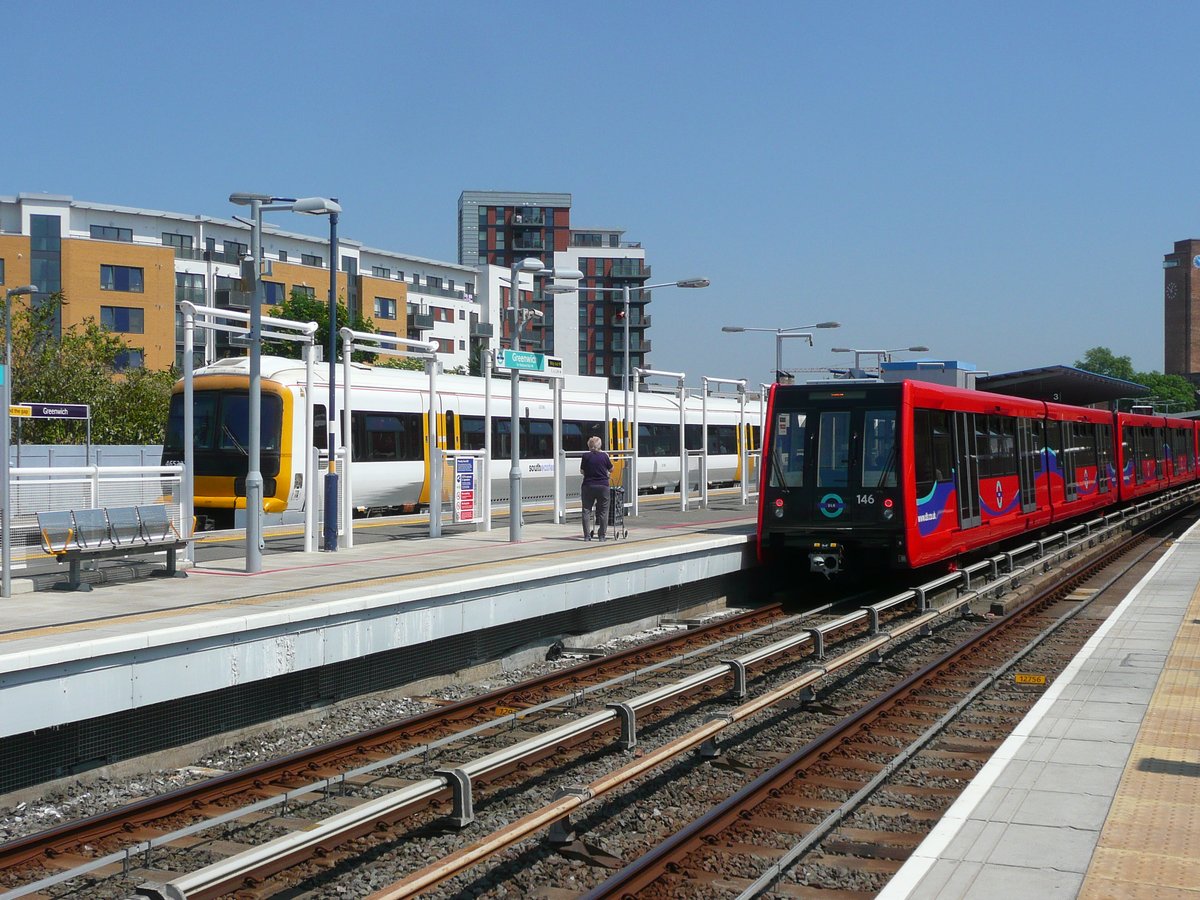 SouthEastern Class 465 237 and London Docklands Light Railway train at Greenwich station