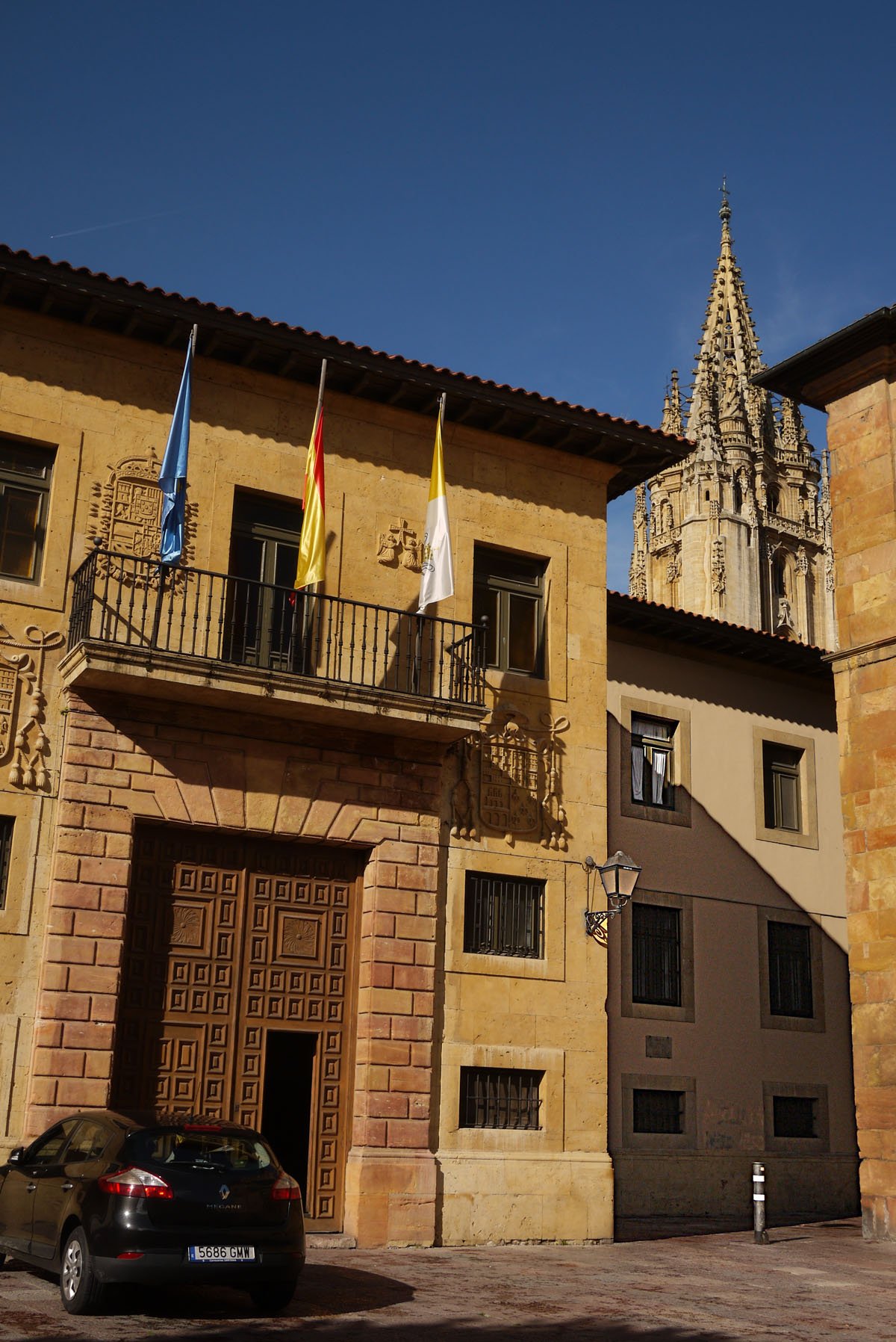 Historic Corrada del Obispo building in Oviedo under a blue sky