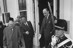 Chancellor Ludwig Erhard visiting Catshuis in Holland with officials Marijnen, Schroder, and Luns on March 2, 1964