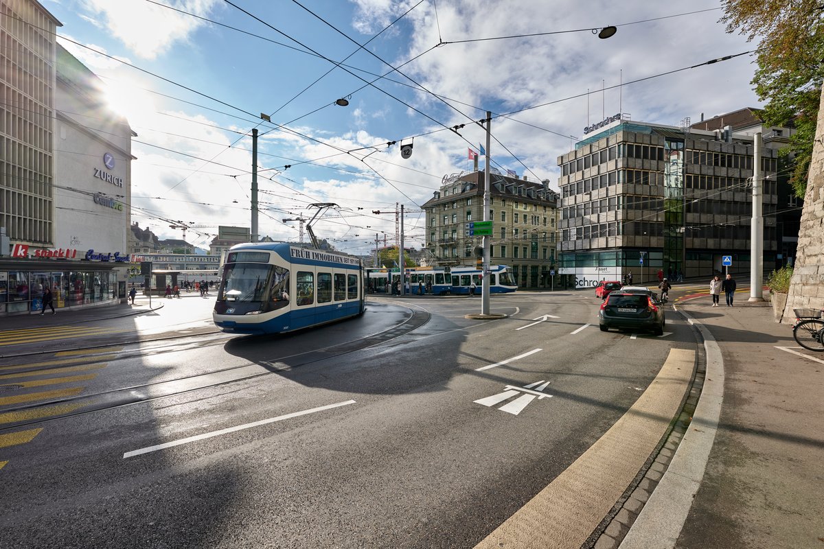 Central square in Zürich with modern buildings and clear sky