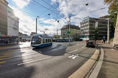 Central square in Zürich with modern buildings and clear sky