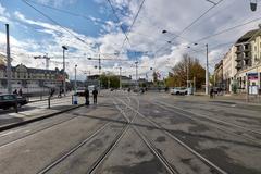 Central square in Zürich with historic buildings and tram tracks