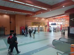 Ampang Park LRT Station exterior entrance with escalators and surrounding urban environment