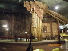 Inside Ho Chi Minh Museum with architectural details and lighting
