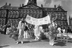 Protest demonstration with banner reading 'Jij wij met EI - de kip en het IJ' on the Dam Square in Amsterdam in 1979