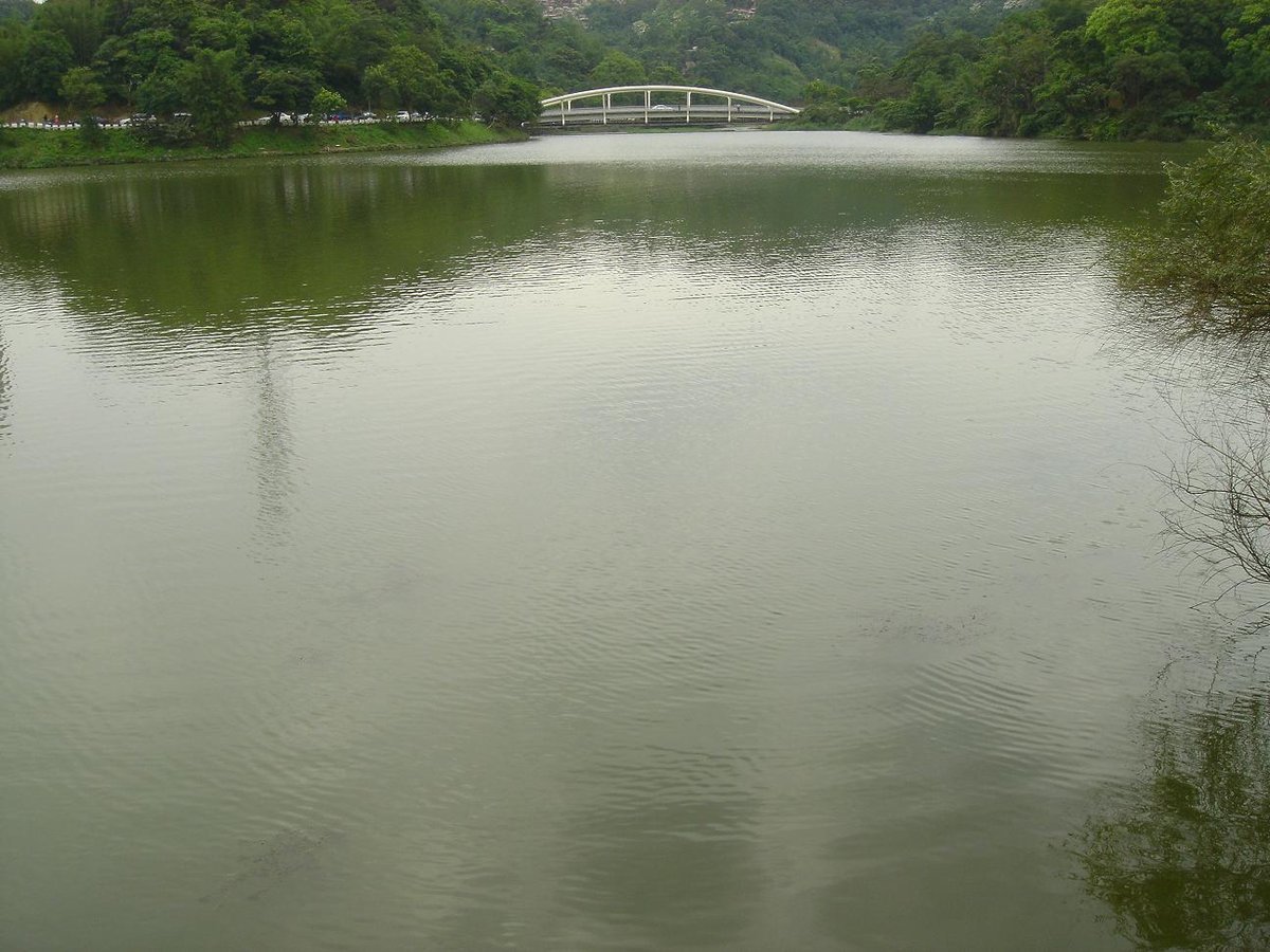 Jinlong Lake with white arch bridge in Taipei, Taiwan