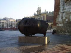 Panoramic view of Krakow cityscape with historic buildings under a clear sky