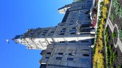 Scenic view of Quebec City waterfront with historic buildings and boats
