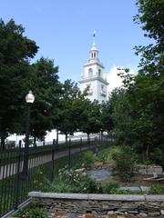 Dorchester Heights Monument surrounded by lush green trees at Boston National Historical Park
