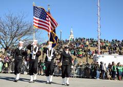 U.S. Navy sailors with color guard marching in St. Patrick's Day Parade in Boston