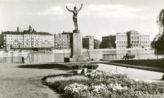 Stockholm city view featuring Solsångaren sculpture and Strömparterren park in 1930s