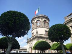 Castle tower Caballero Alto at Chapultepec Castle with Mexican flag on top
