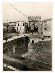 Arch of Augustus in Rimini in 1937 with nearby Rimini-Novafeltria railway crossing and Ausa river