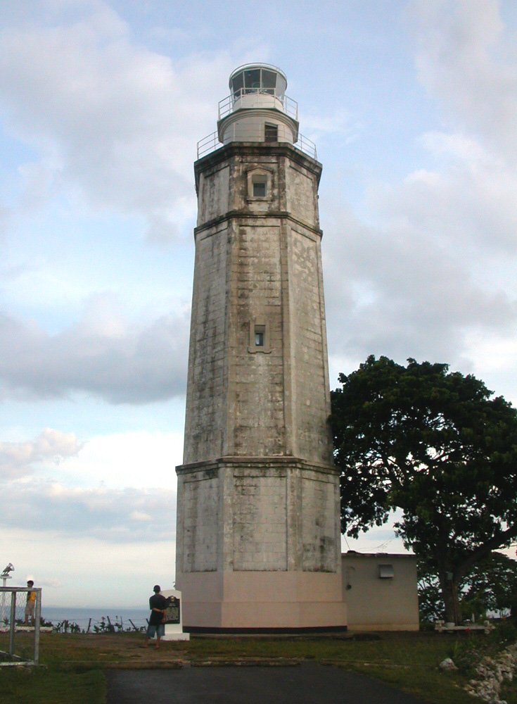 Bagacay Point Lighthouse in Liloan, Cebu, Philippines on a rocky coastline