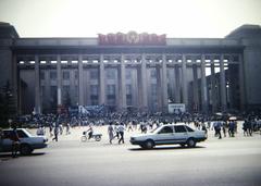 National Museum building exterior with flags and trees