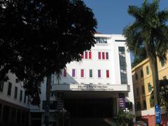 Vietnamese Women's Museum entrance with traditional architectural design and lush green trees