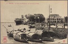 View of La Pointe des Blagueurs with Le Paul-Lecat ship on the harbor in Saigon