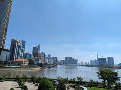Front view of Ho Chi Minh Museum in Saigon with modern architecture and clear blue sky
