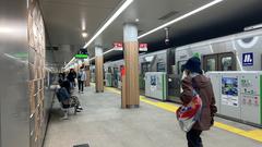 Osaka Metro Sakaisuji-Hommachi Station entrance with modern architectural design