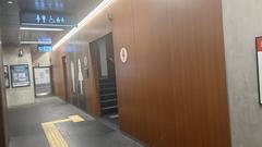 Shinsaibashi Station entrance of Osaka Metro with modern glass and metal architecture