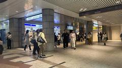 Shinsaibashi Station Entrance with Blue Canopy and Pedestrian Walkway