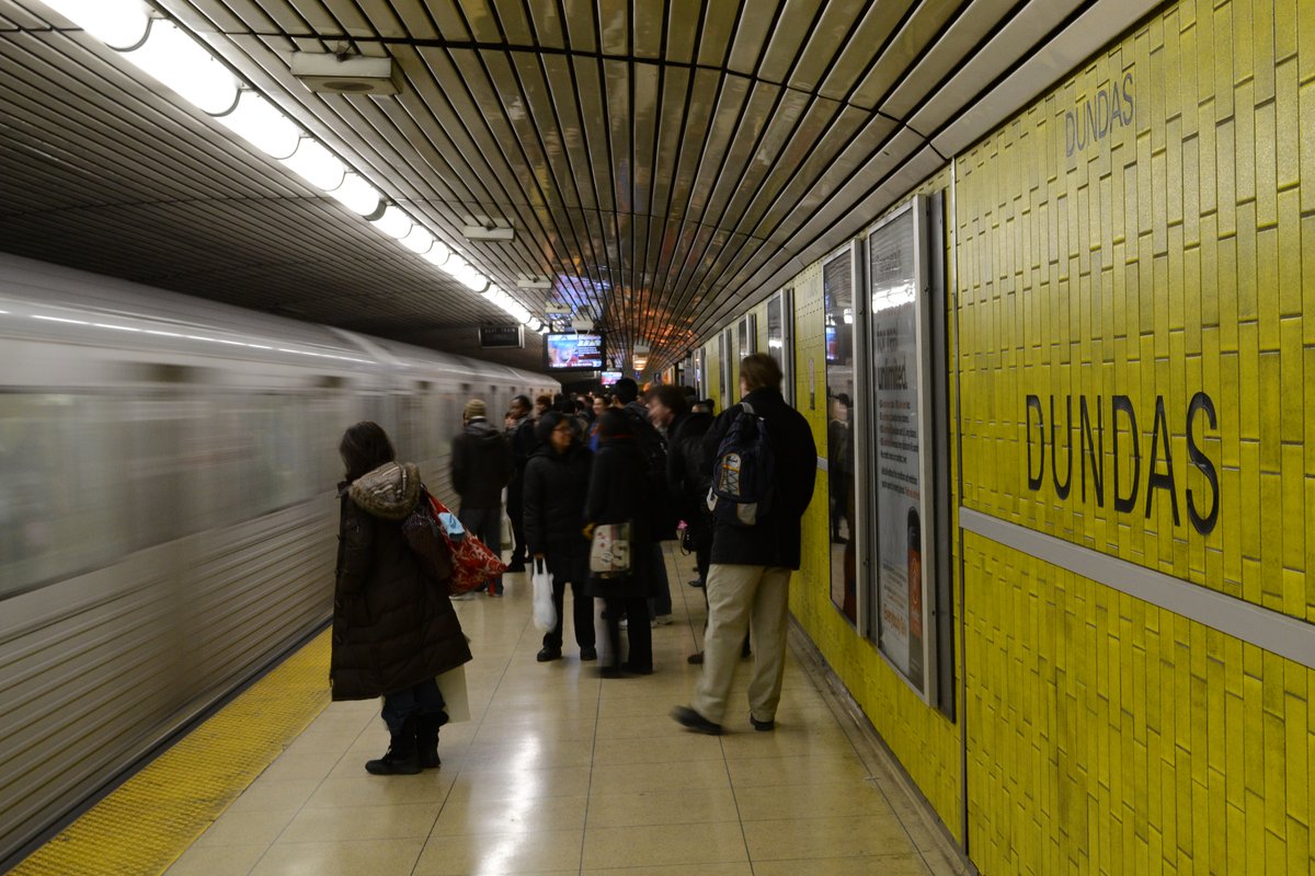 Dundas Subway Station platform with tracks and signage