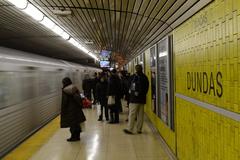 Dundas Subway Station platform with tracks and signage