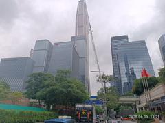 Fuhua Road in Futian district of Shenzhen in June 2025, modern high-rise buildings and clear sky