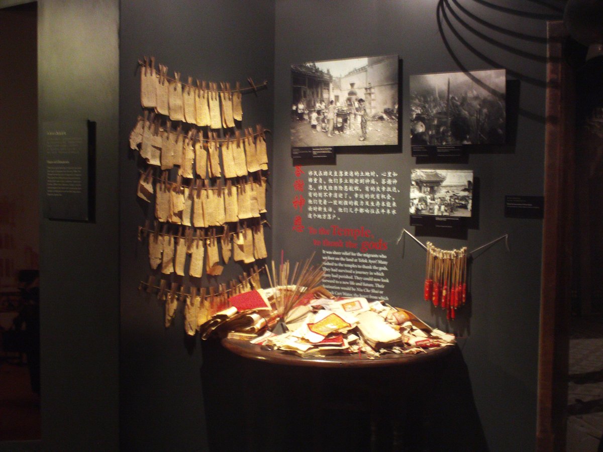 Burning incense sticks on display inside Chinatown Heritage Centre