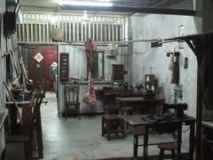 Clothes manufacturing exhibit inside Chinatown Heritage Centre