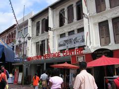 Street view of Chinatown Heritage Centre at Pagoda Street with historical buildings and signage