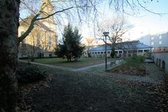 Christians Kirke churchyard in Copenhagen Denmark with gravestones and historic church building