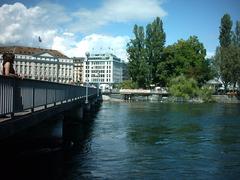 Pont des Bergues and Île Rousseau in Geneva, Switzerland with scenic lake view