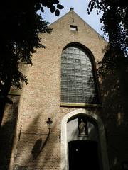 West facade of Begijnhofkerk Sint Elisabeth church in Brugge with Gothic architecture