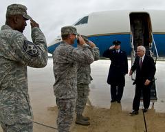 U.S. Defense Secretary Robert M. Gates arriving at Kelly Air Force Base in Texas greeted by U.S. Air Force Brig. Gen. Leonard Patrick, Col. Eric Wilbur, and Chief Master Sgt. Juan Lewis